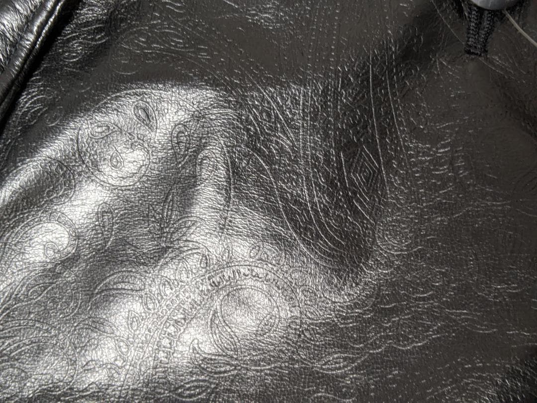 189　新品未使用タグ付　超軽量　鹿革　リアルレザー　フリル　ロングコート