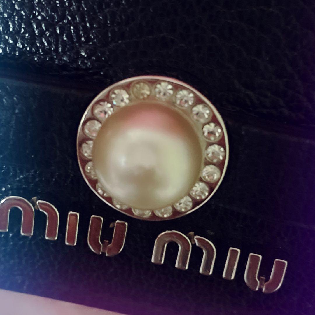 な*な様 miumiu マドラスパール2つ折り財布 ブラック