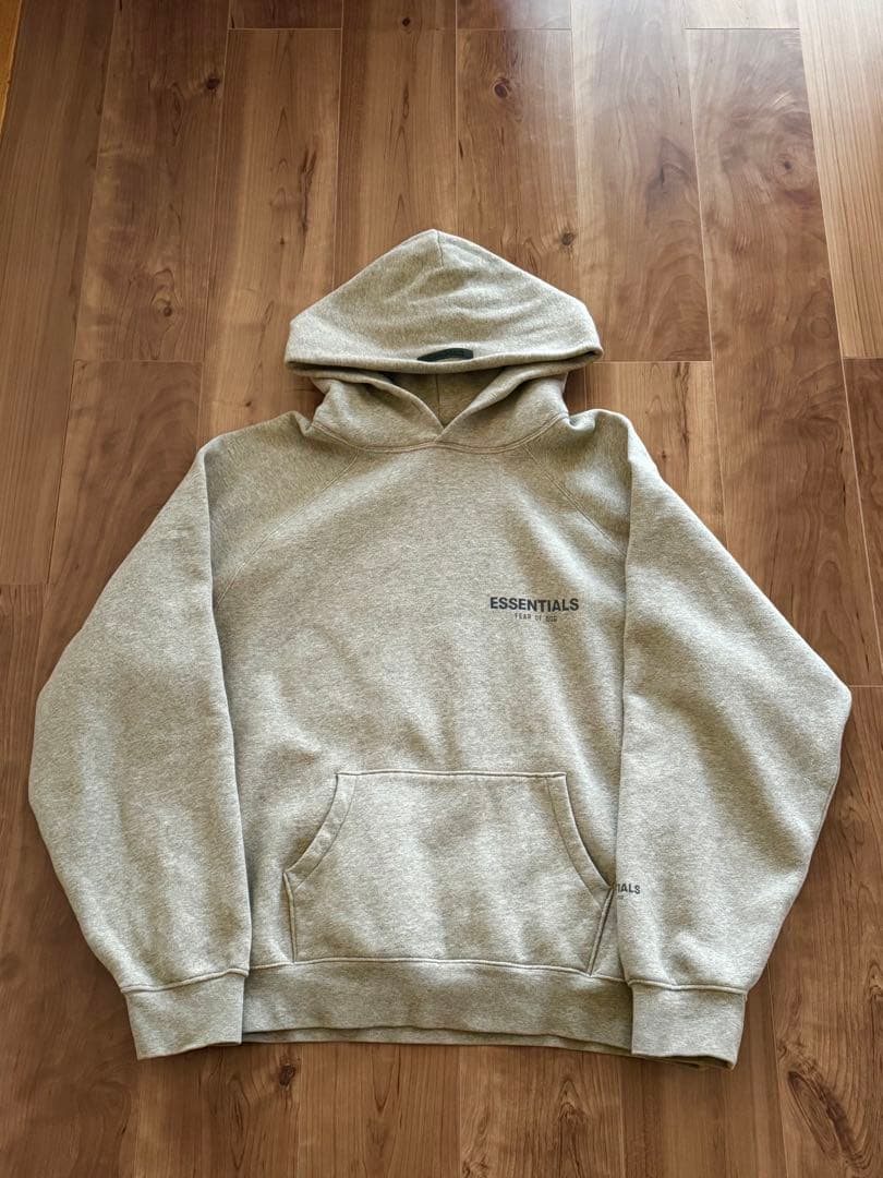 ESSENTIALS グレー フード付きパーカー