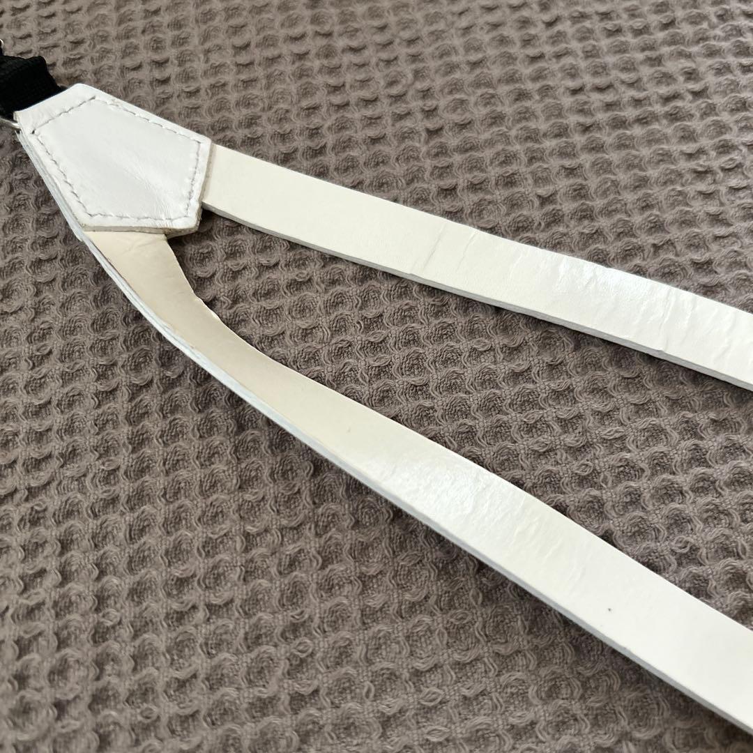 【TOGA PULLA(トーガプルラ)】コンチョサスペンダー