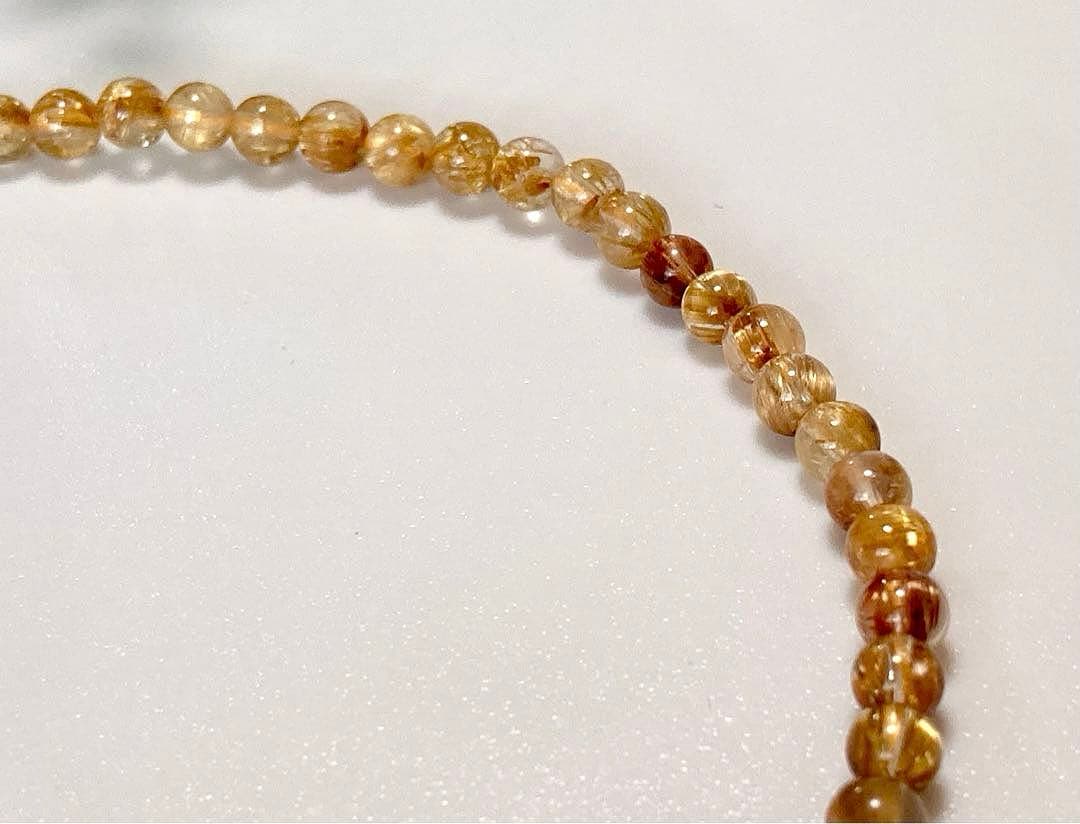 究極品質　超希少幻の逸品　天然石の王者　タイチンルチルキャッツアイの多重編み