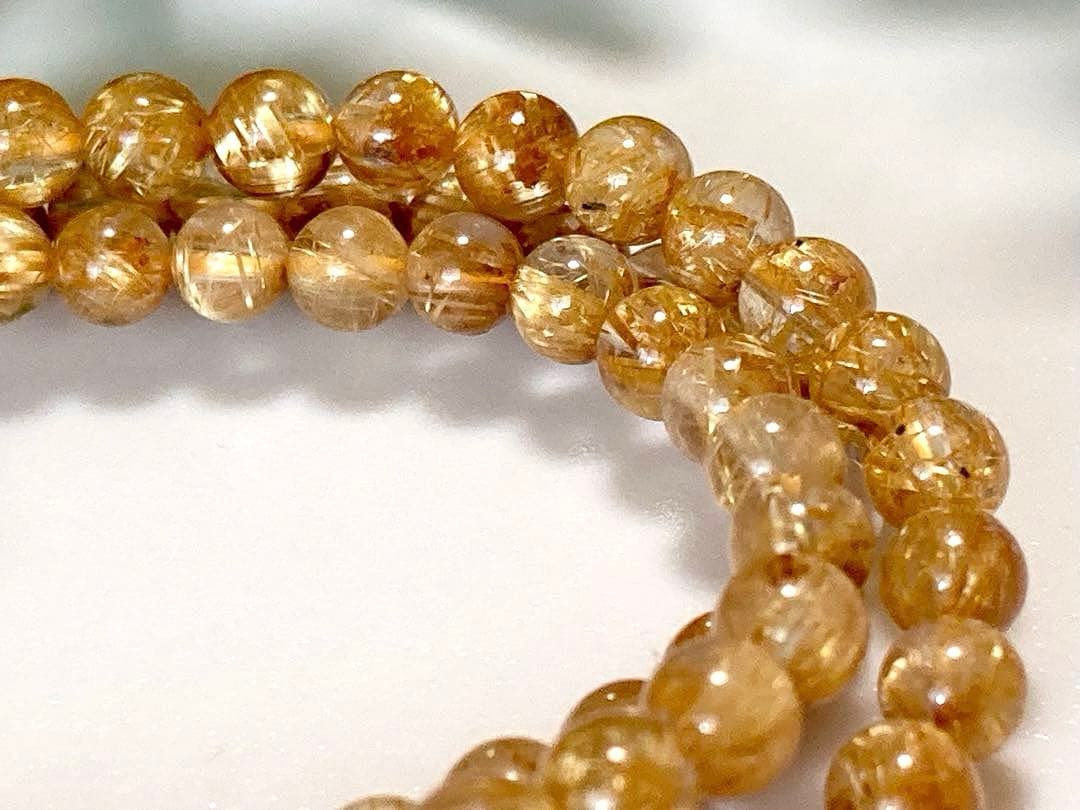 究極品質　超希少幻の逸品　天然石の王者　タイチンルチルキャッツアイの多重編み