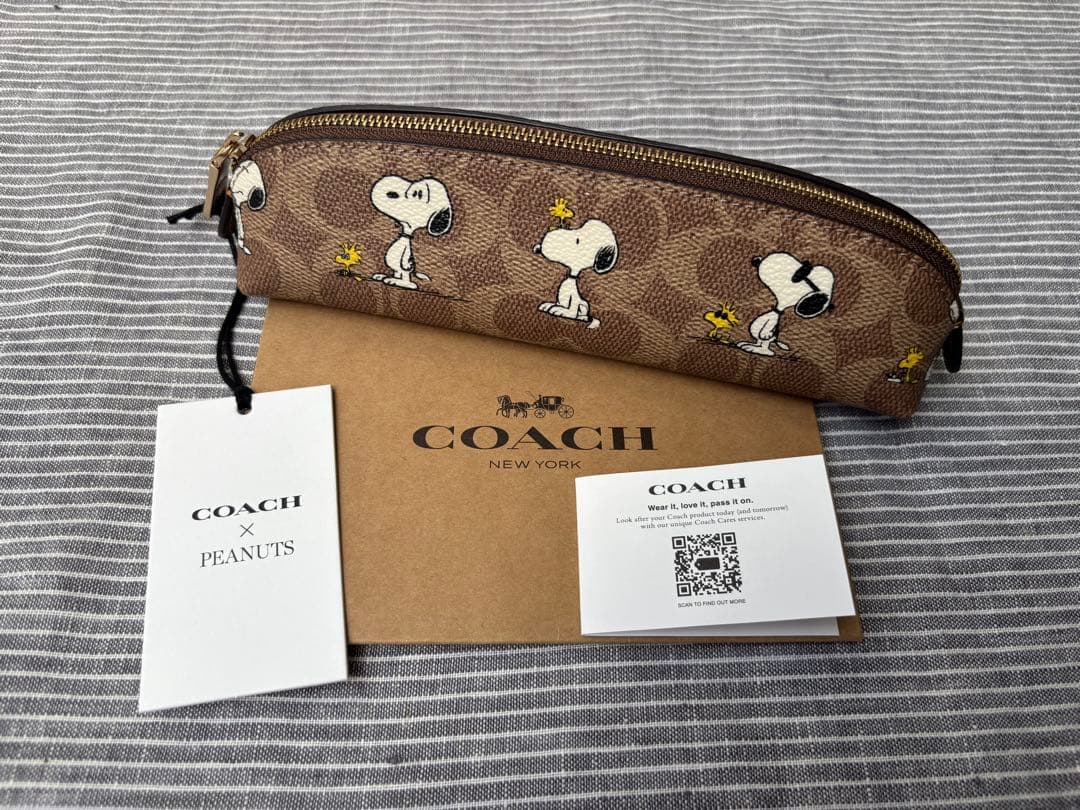 新品　COACH x PEANUTS スヌーピー ペンケース　シグネチャー