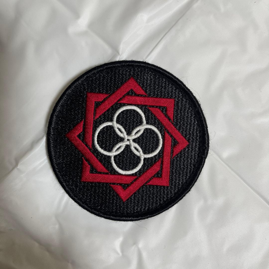 田村装備開発のワッペン（赤）と買い物袋のセットです。