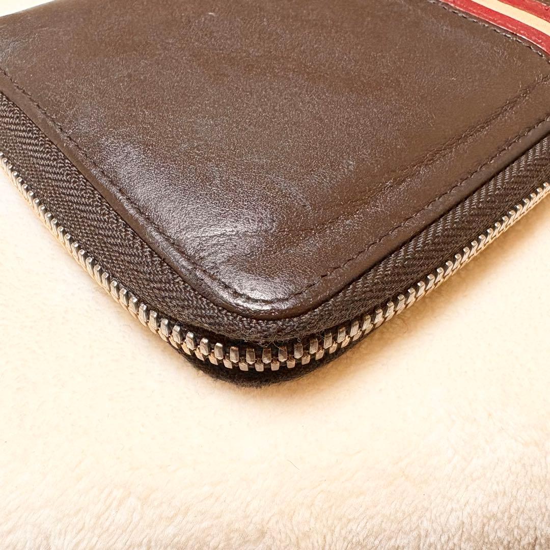 BALLY レザー 長財布 ダークブラウン ラウンドファスナー ストライプ