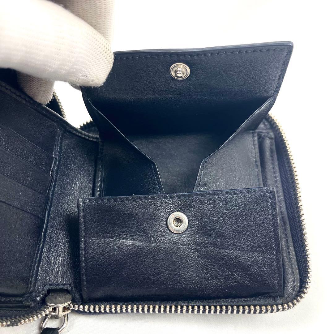 ジミーチュウ　折り財布　ラウンドファスナー　スター　エンボスレザー　星　ロゴ