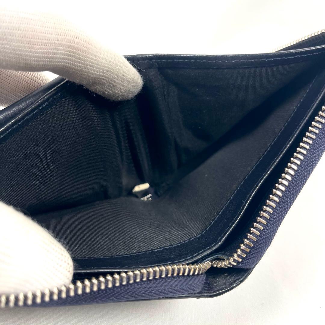 ジミーチュウ　折り財布　ラウンドファスナー　スター　エンボスレザー　星　ロゴ