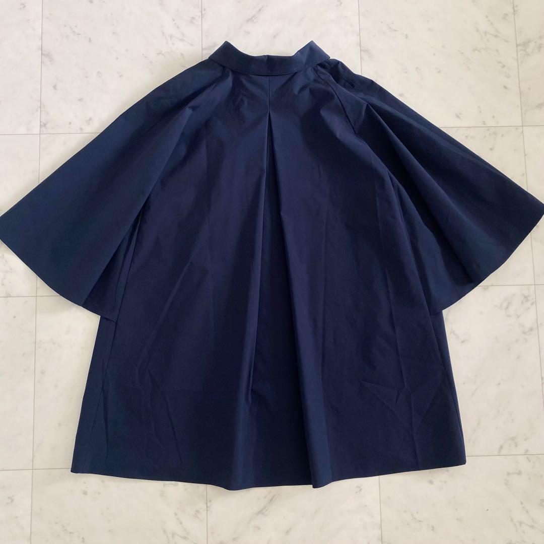 美品 アドーア ADOREスパンライクタイプライターブラウス ポンチョ 紺色