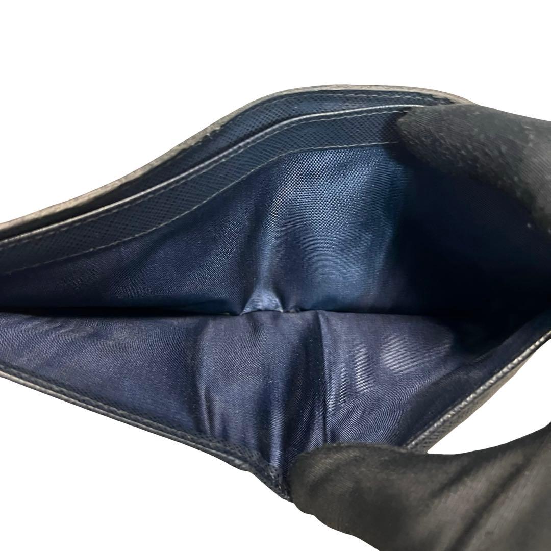 希少✨プラダ 二つ折り財布 サフィアーノレザー ロゴ金具 ネイビー ブルー