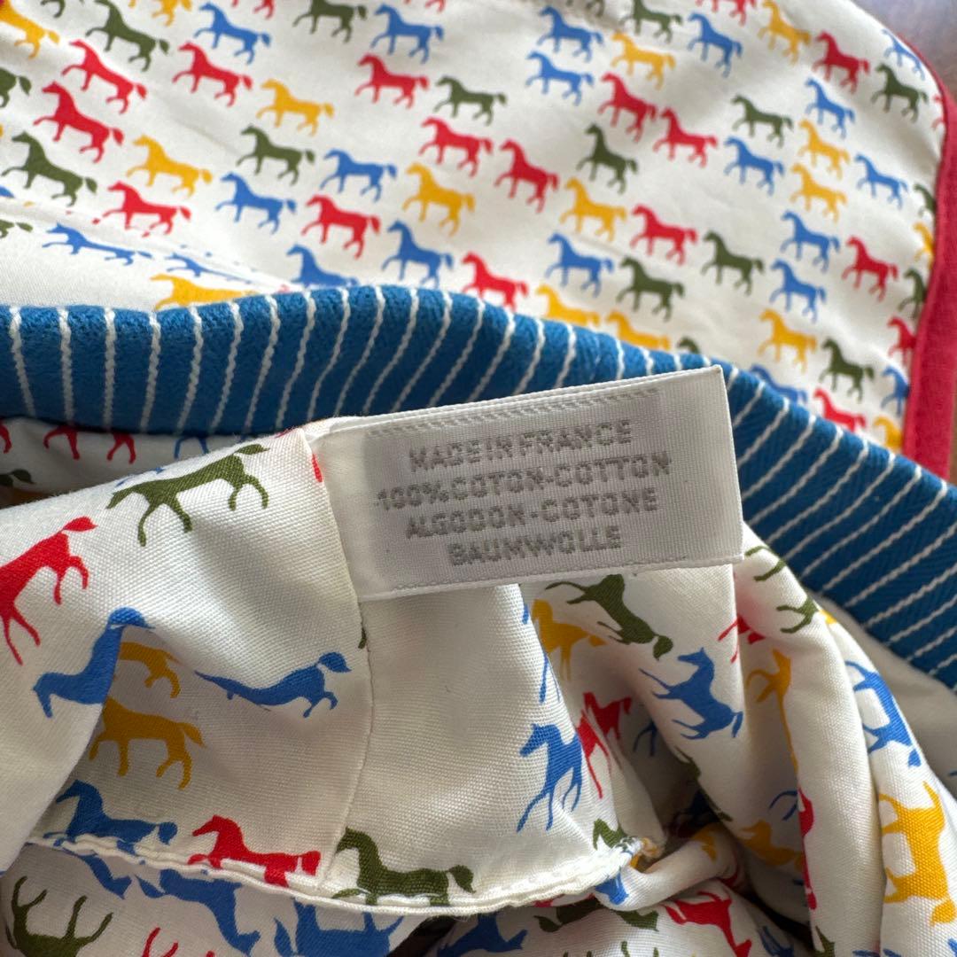 HERMES ベビーリュック　青と赤のストライプ