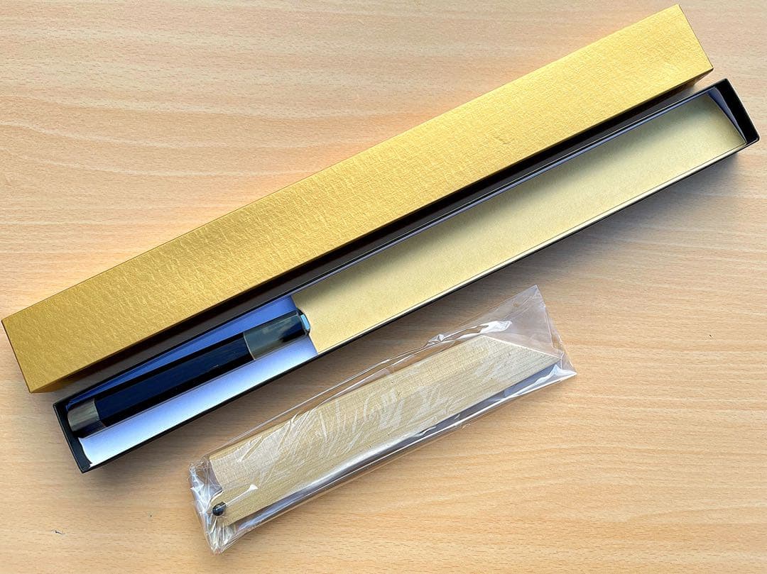 未使用 超鋼スーパー本焼 六寸 ギザ 切付型 黒檀 上下白水牛 鞘付き 城山刃物