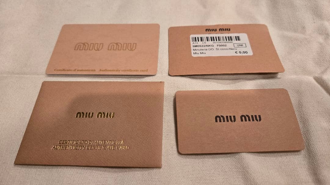 MIU MIU 二つ折り財布 黒