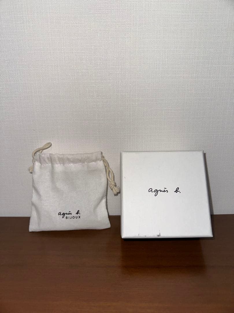 agnes b. ペアネックレス \"Be my other half\"