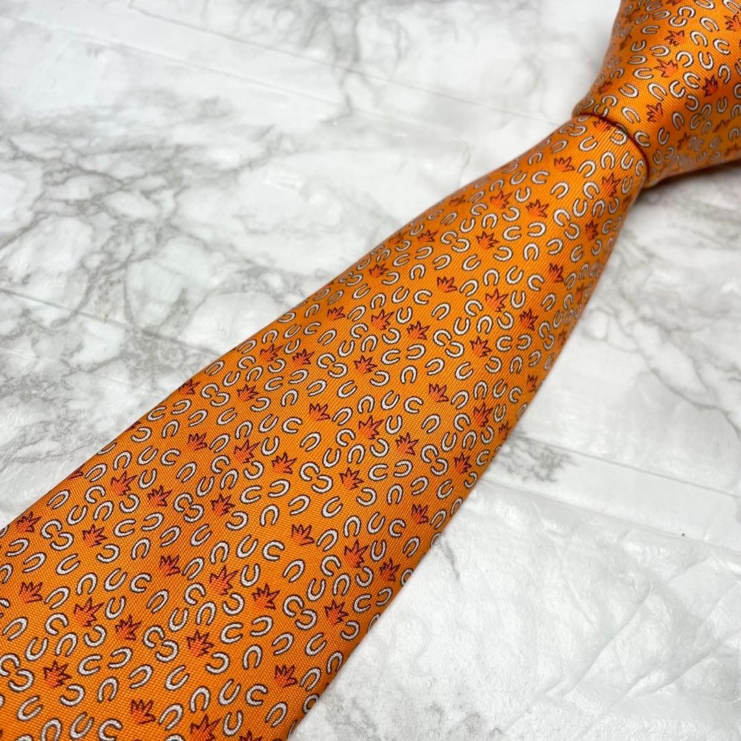 HERMES エルメス　ネクタイ馬蹄　馬　オレンジ