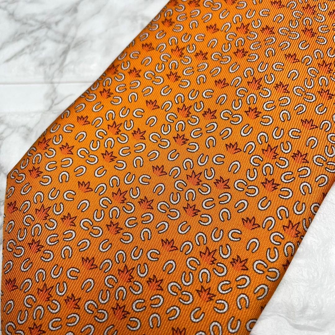 HERMES エルメス　ネクタイ馬蹄　馬　オレンジ