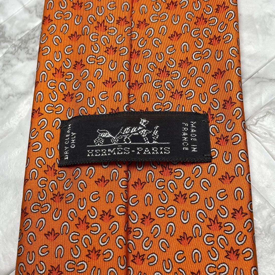 HERMES エルメス　ネクタイ馬蹄　馬　オレンジ