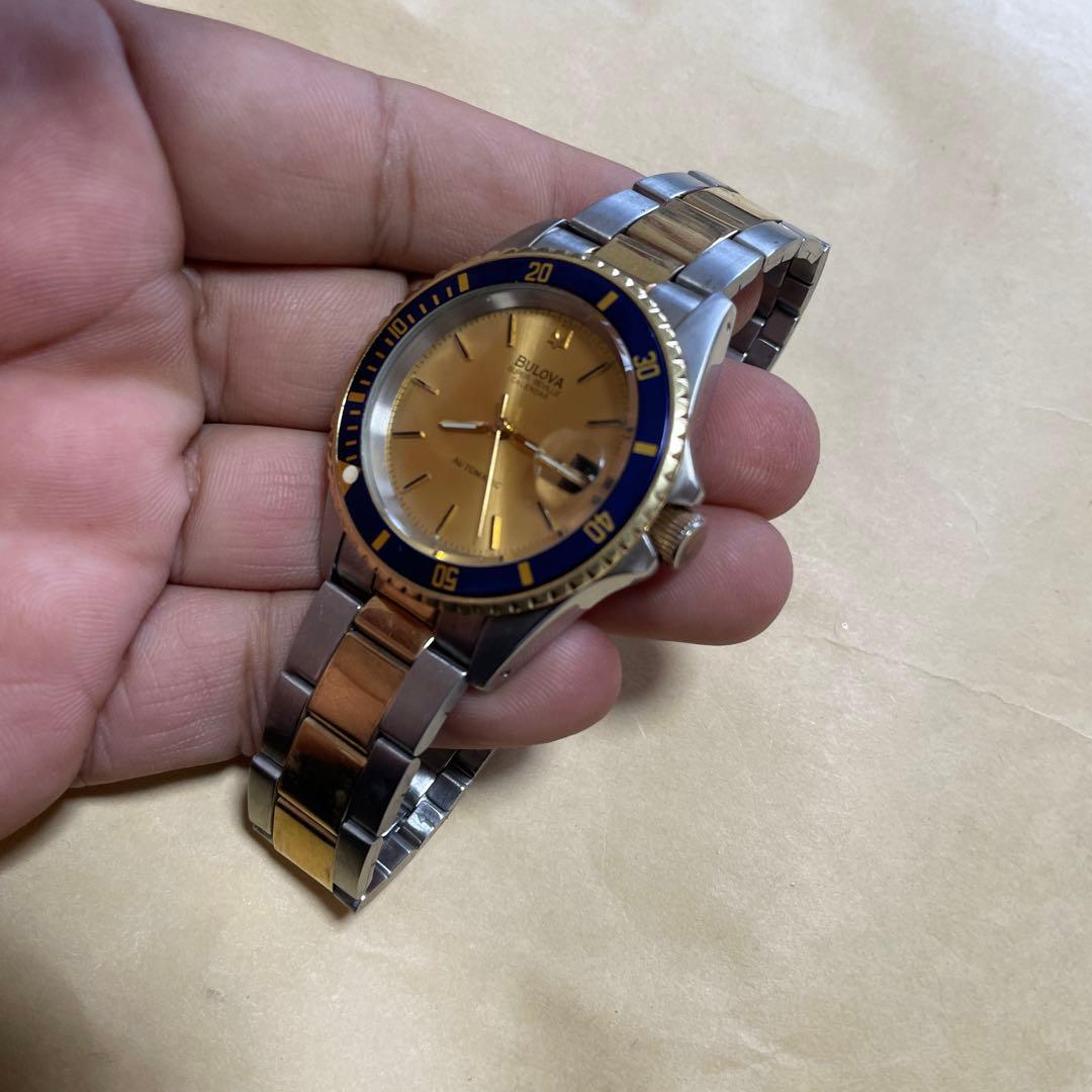 E*y様 Bulova 自動巻き 腕時計 金色/青色