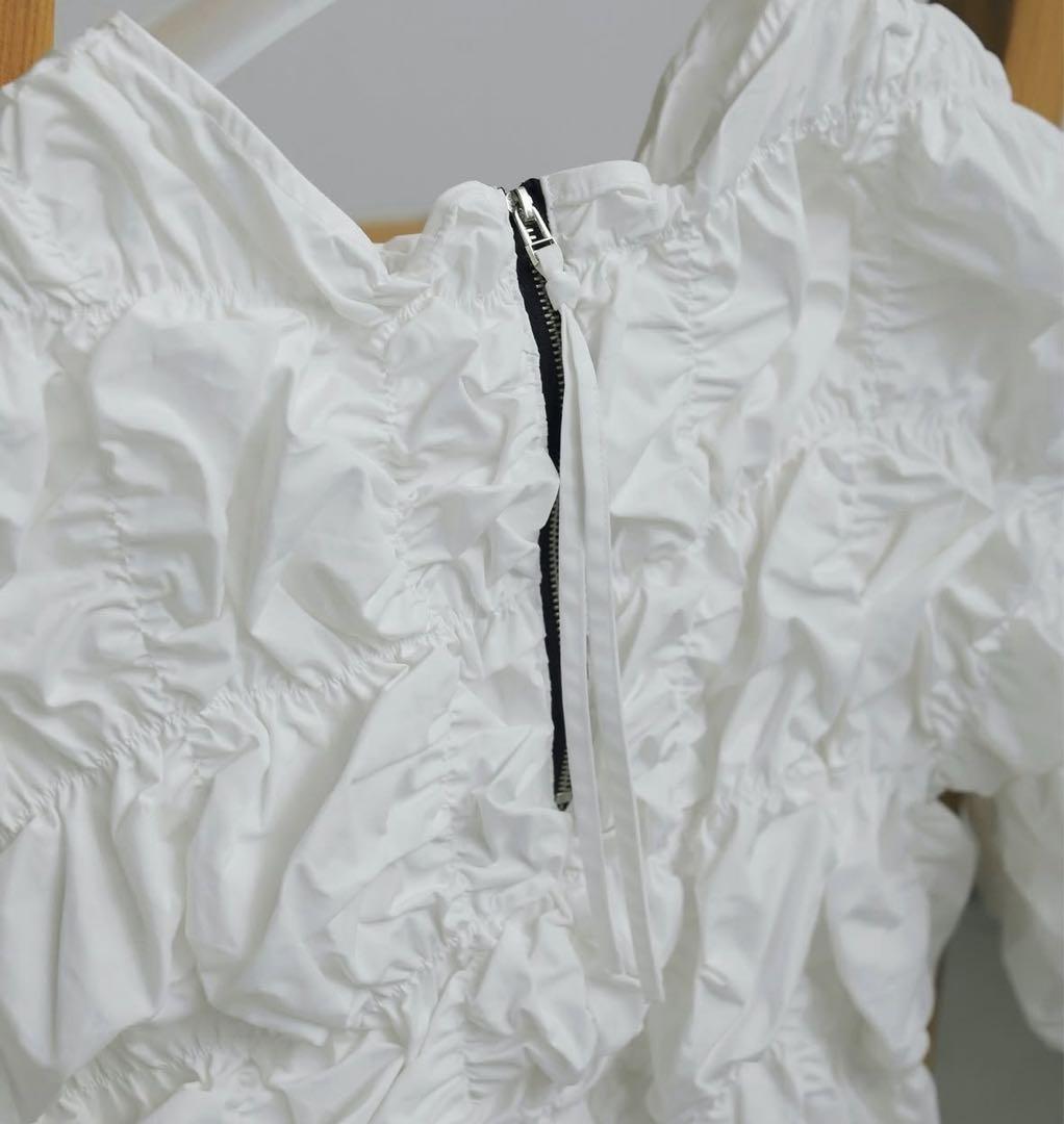 アンヌーク　シャーリング　ブラウス　トップス