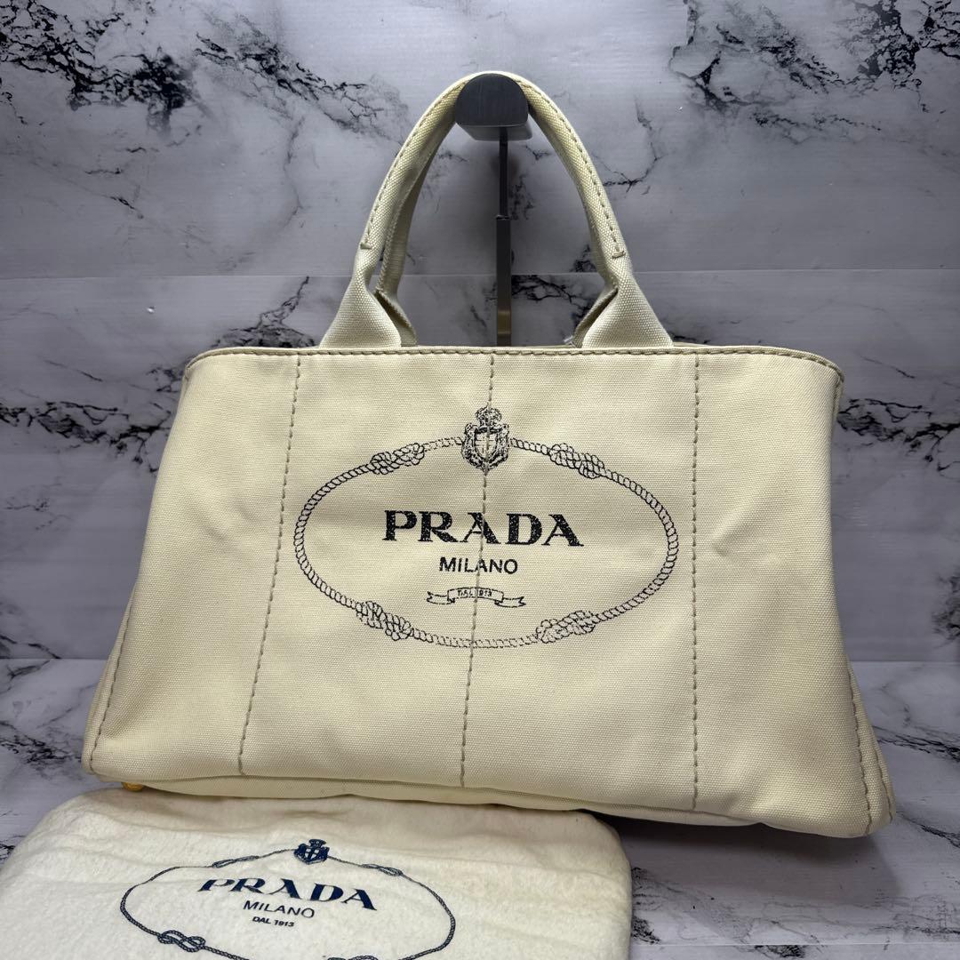 (美品)大人気、プラダ、カナパ、人気サイズ、L、人気色、ベージュ、3角プレート