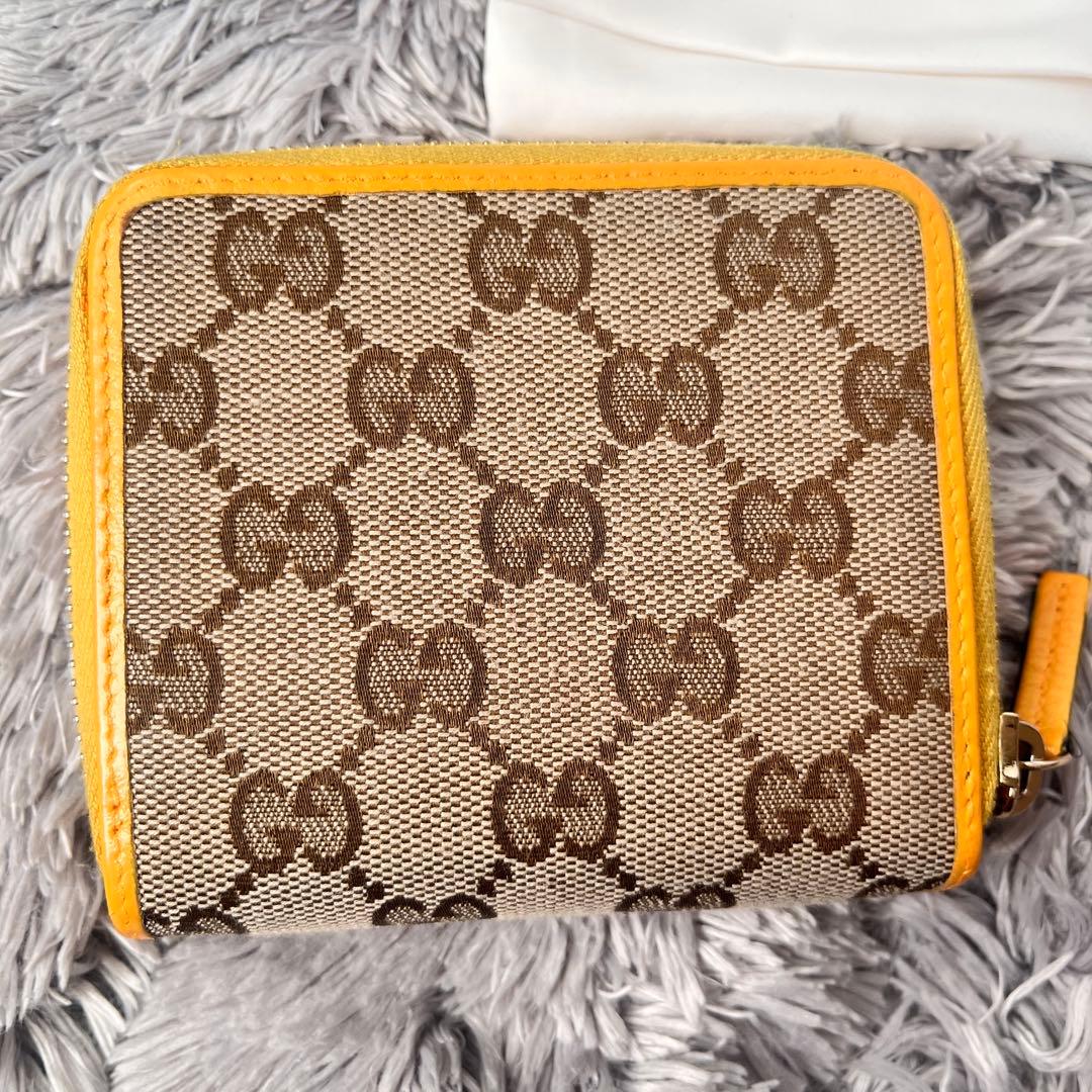 GUCCI 折り財布　GGキャンバス イエロー　ラウンドファスナー