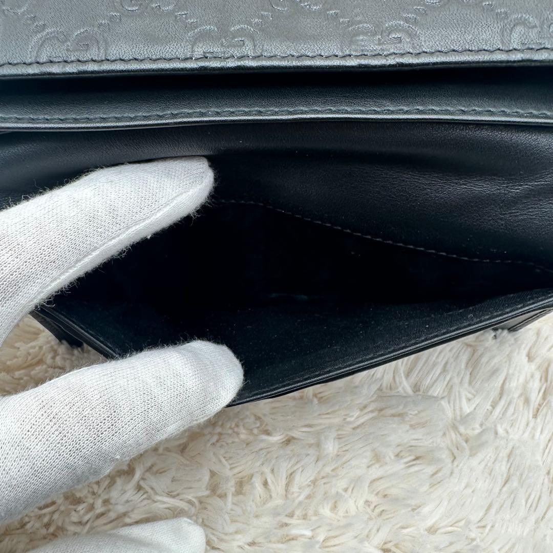 ✨美品✨グッチ　長財布　二つ折り財布　GG柄 ロゴプレート　レザー　黒