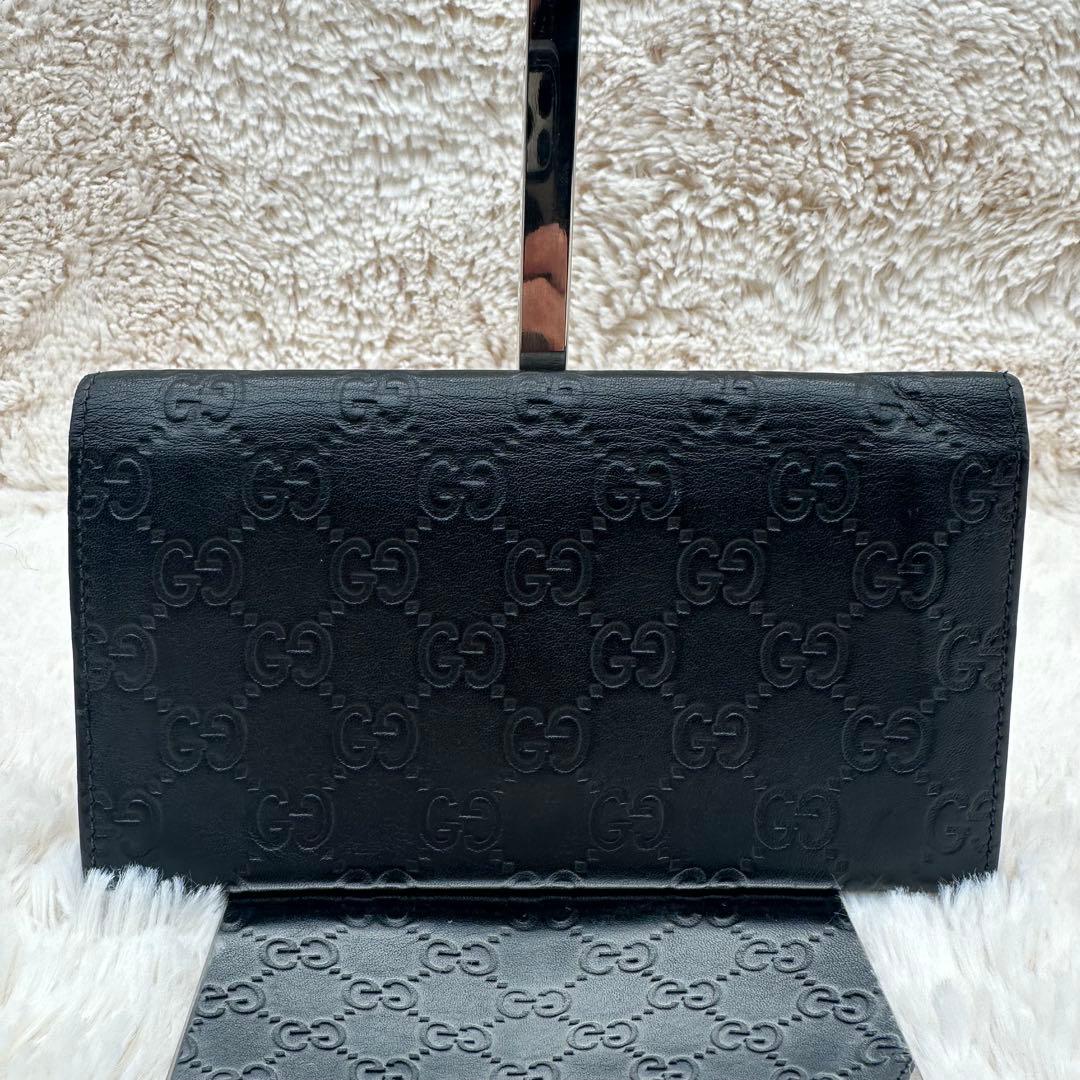 ✨美品✨グッチ　長財布　二つ折り財布　GG柄 ロゴプレート　レザー　黒
