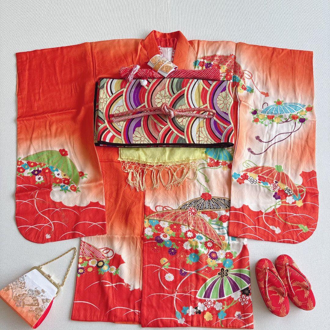 フルセット七五三７歳女の子　オレンジ地　傘椿　黒地袋帯　袖なし長襦袢7125