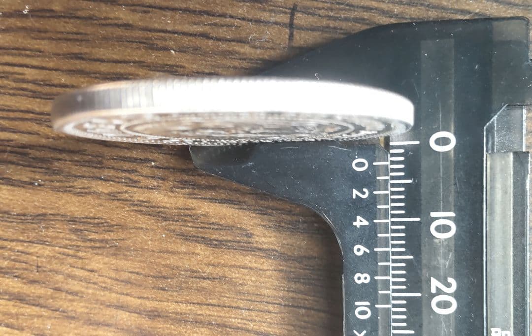 シ*n様 貿易銀 明治10年銀貨保証