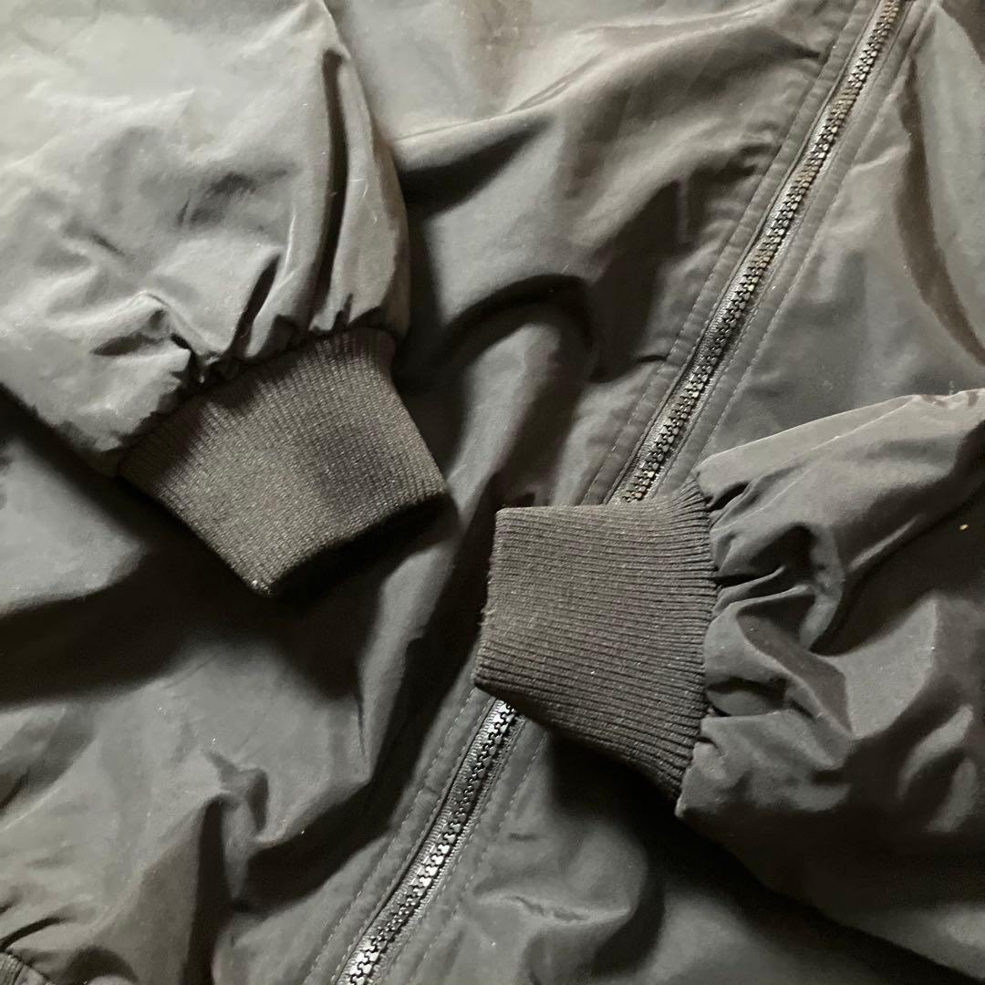 00sTRIMOUNTAIN企業ロゴウォームアップジャケットナイロンブラック黒M