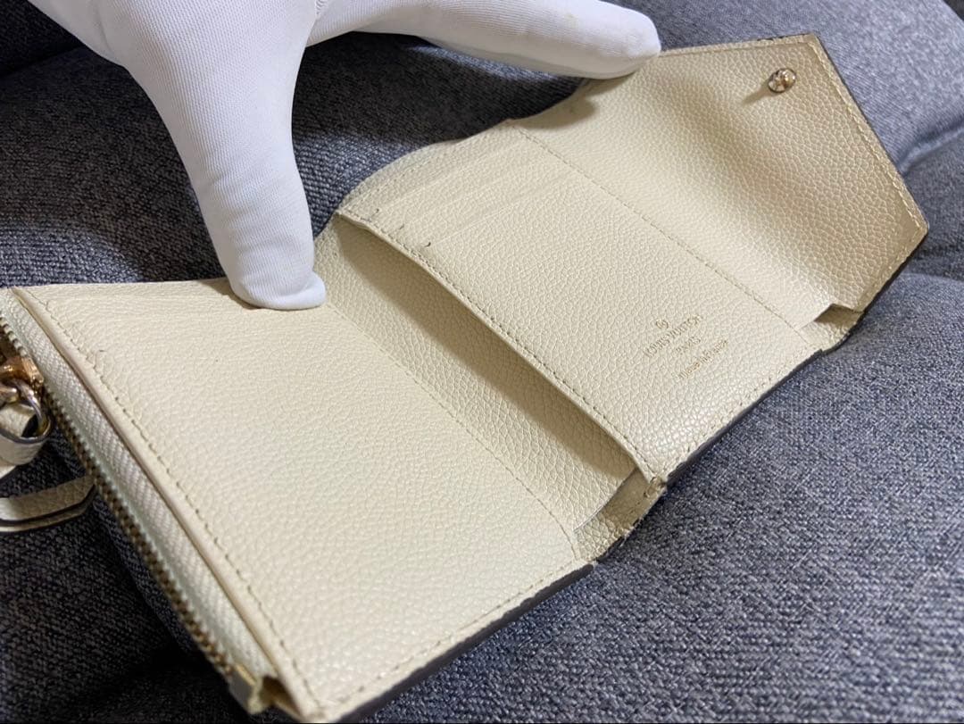 M*u様 LOUIS VUITTON 三つ折り財布