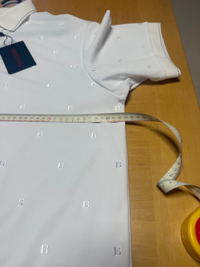 ブリーフィング　ホワイト B刺繍 ポロシャツ 新品(未使用) タグ付きサイズＸL