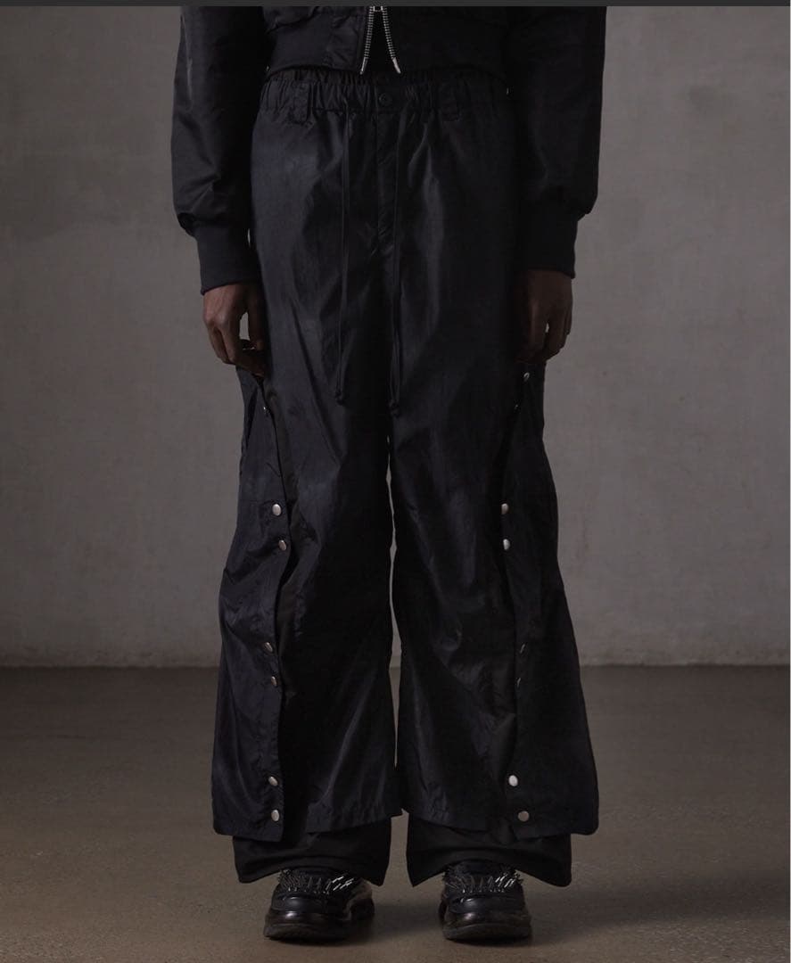 grancy ボタンレイヤードデザインナイロンパンツ