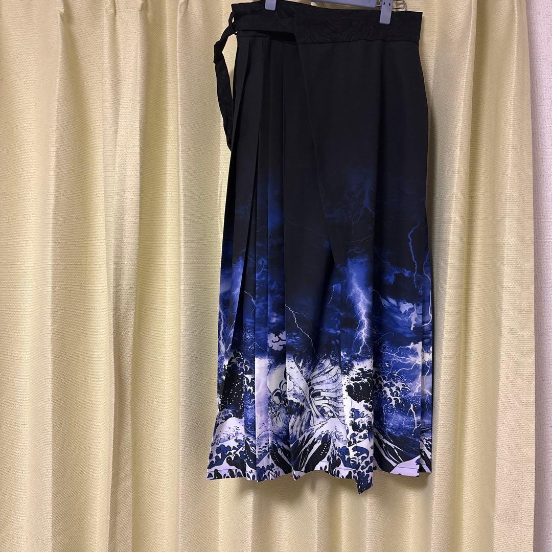 axes femme ガシャドクロ柄巻きスカート