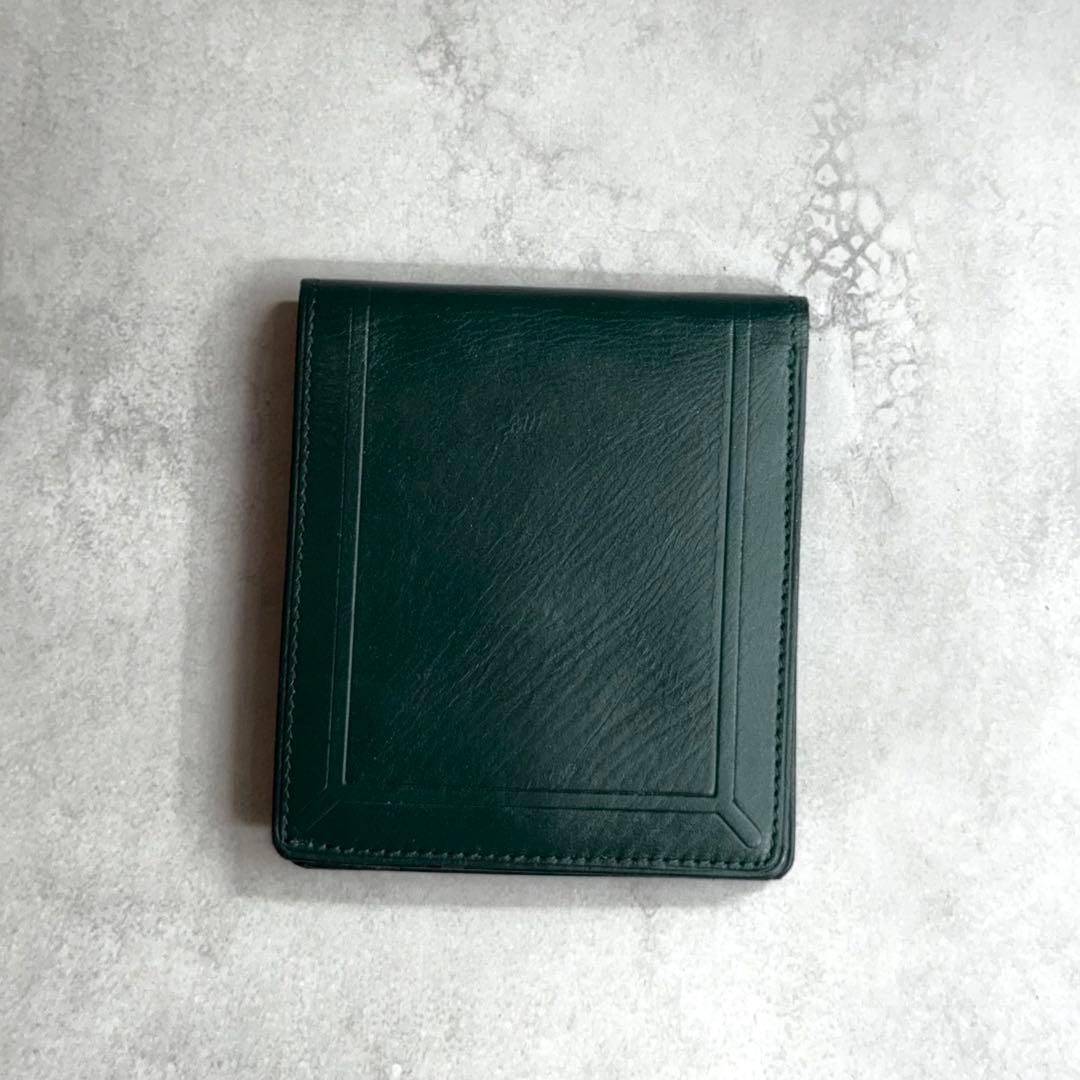 YVES SAINT LAURENT / カサンドラエンボスコンパクトウォレット