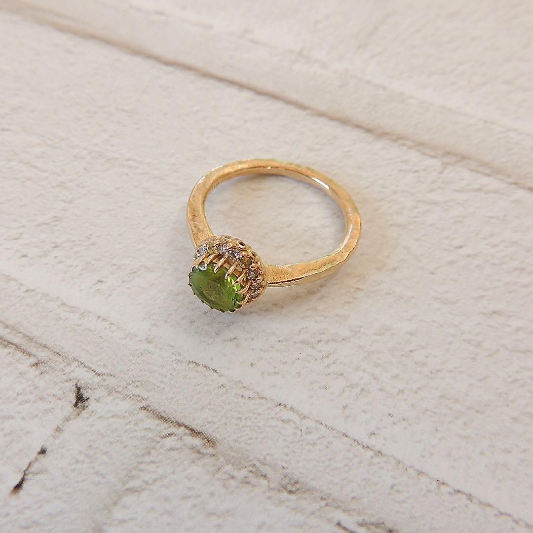 パーセルジュエリー ペリドット ポンポネアンスールリング 11号