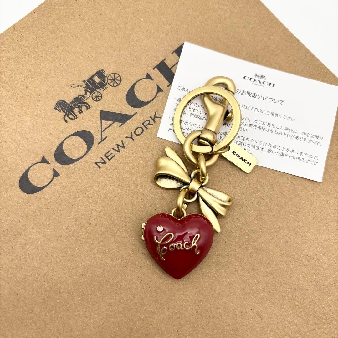 【COACH☆新品】ボウ ハート ロケット☆バッグ チャーム☆ブラス ルビー