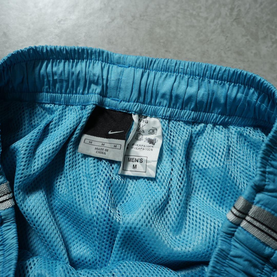00s NIKE ワイドナイロンパンツ 水色 サイドライン 刺繍ロゴ y2k