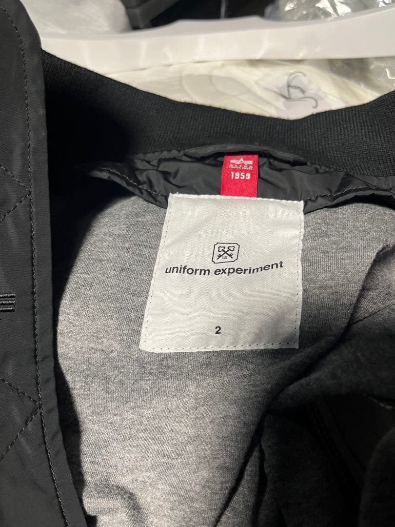 ジャケット・アウター uniform experiment ASGER JORN ALPHA MA-1