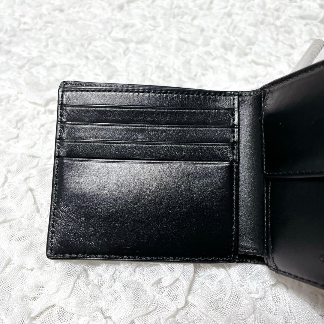 コーチ　シグネチャー　ブラック　レザー　二つ折り　財布　小銭入れ付　コンパクト