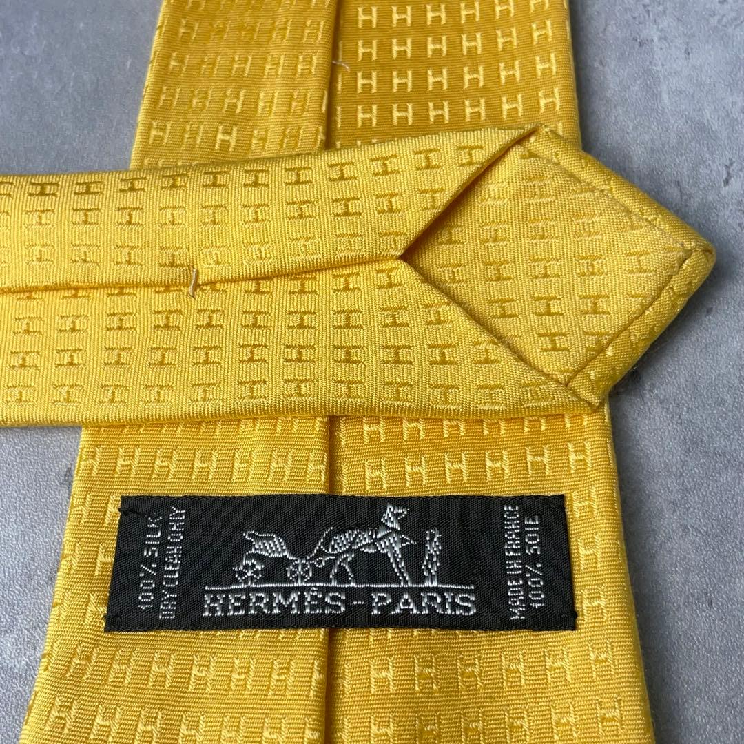 美品 HERMES エルメス H柄 総ロゴ ファソネ ネクタイ イエロー 黄
