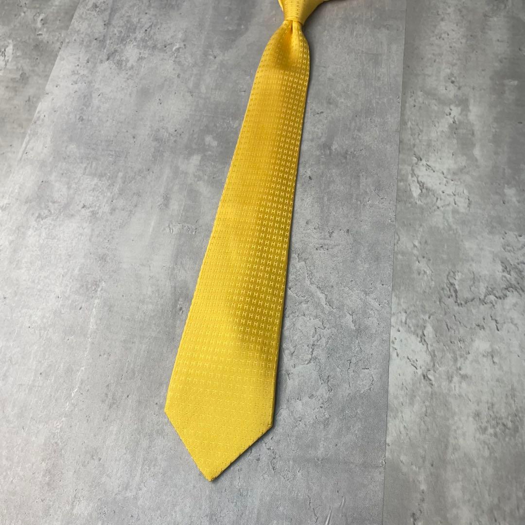 美品 HERMES エルメス H柄 総ロゴ ファソネ ネクタイ イエロー 黄