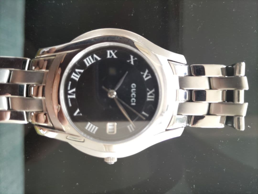 GUCCI ローマ数字 金属ベルト 時計 550M