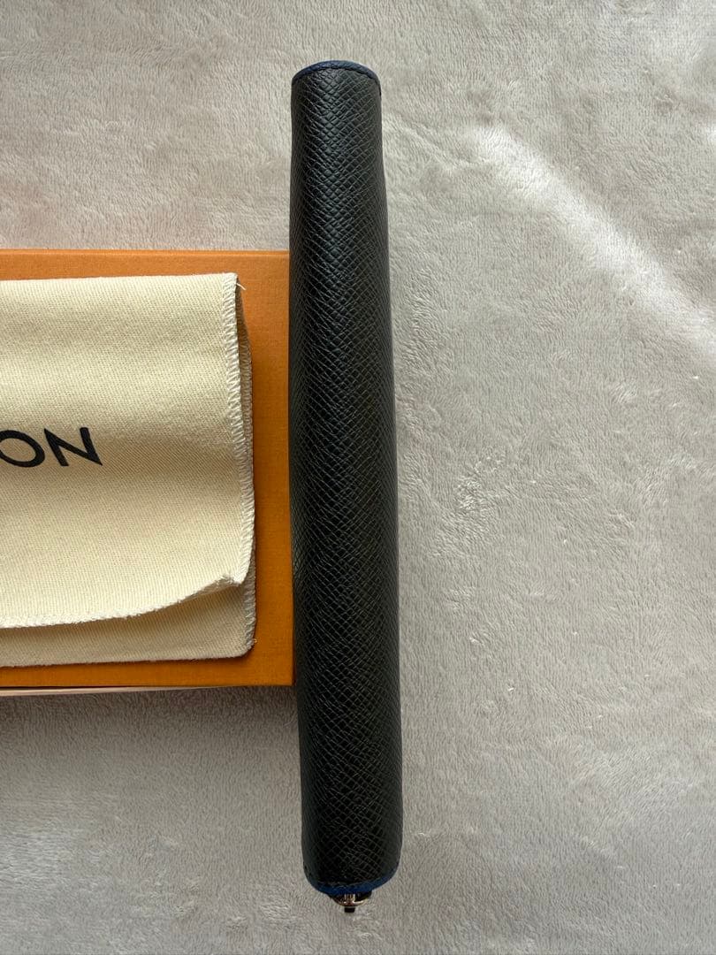 ルイヴィトンM30569 タイガ ジッピーウォレットヴェルティカル 長財布