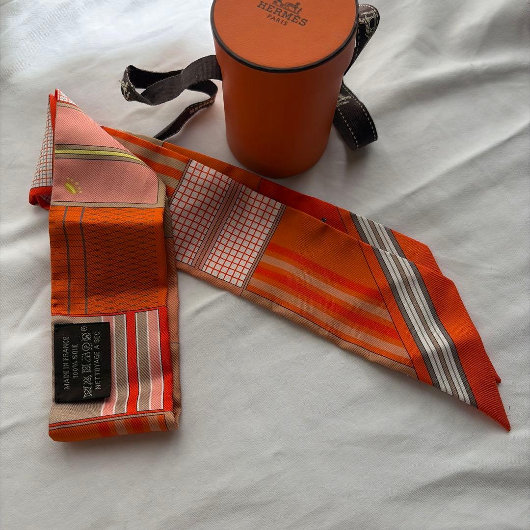 HERMES ツイリー　オレンジ系　馬柄