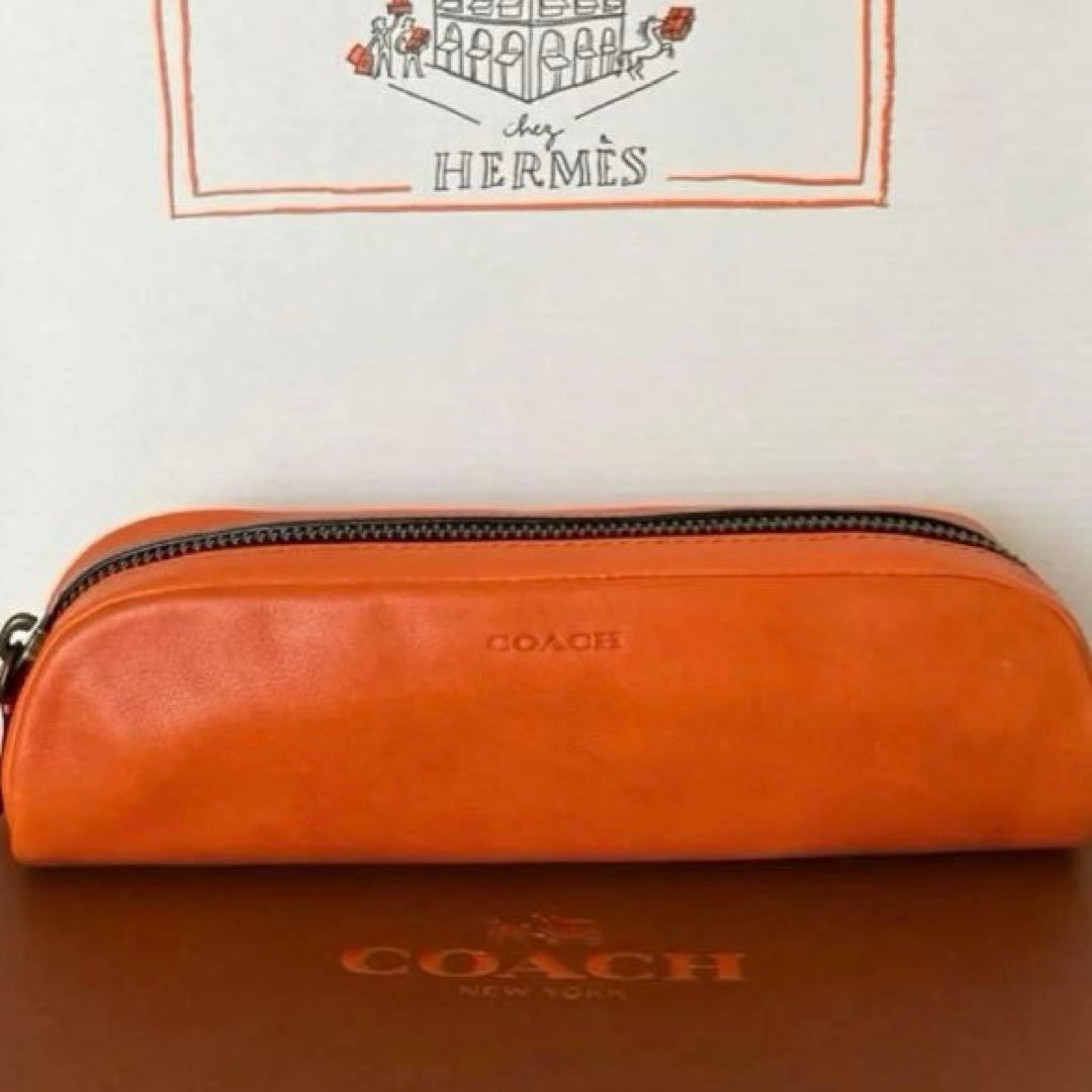 【新品未使用】COACH カーフレザー ペンシルケース　サンバ　オレンジ　箱付き