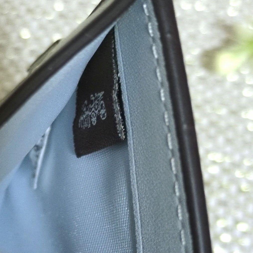 COACH グリーン 花柄 折財布 パス入れあり　美品✨️