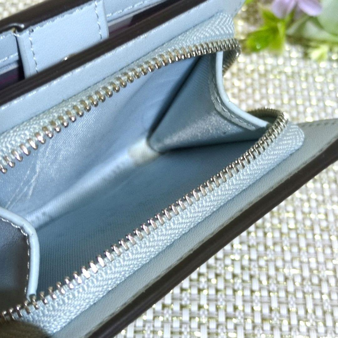 COACH グリーン 花柄 折財布 パス入れあり　美品✨️