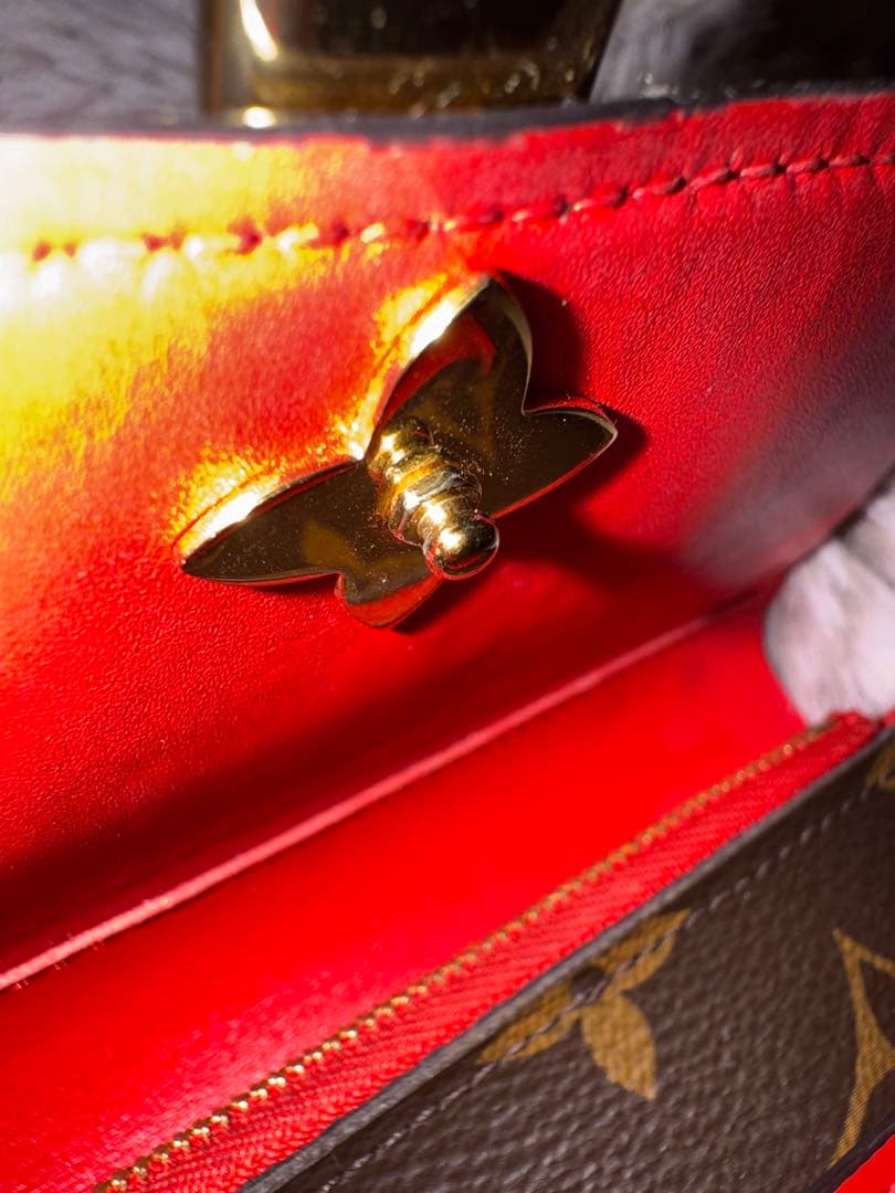 ルイヴィトン モノグラム 折り財布 南京錠