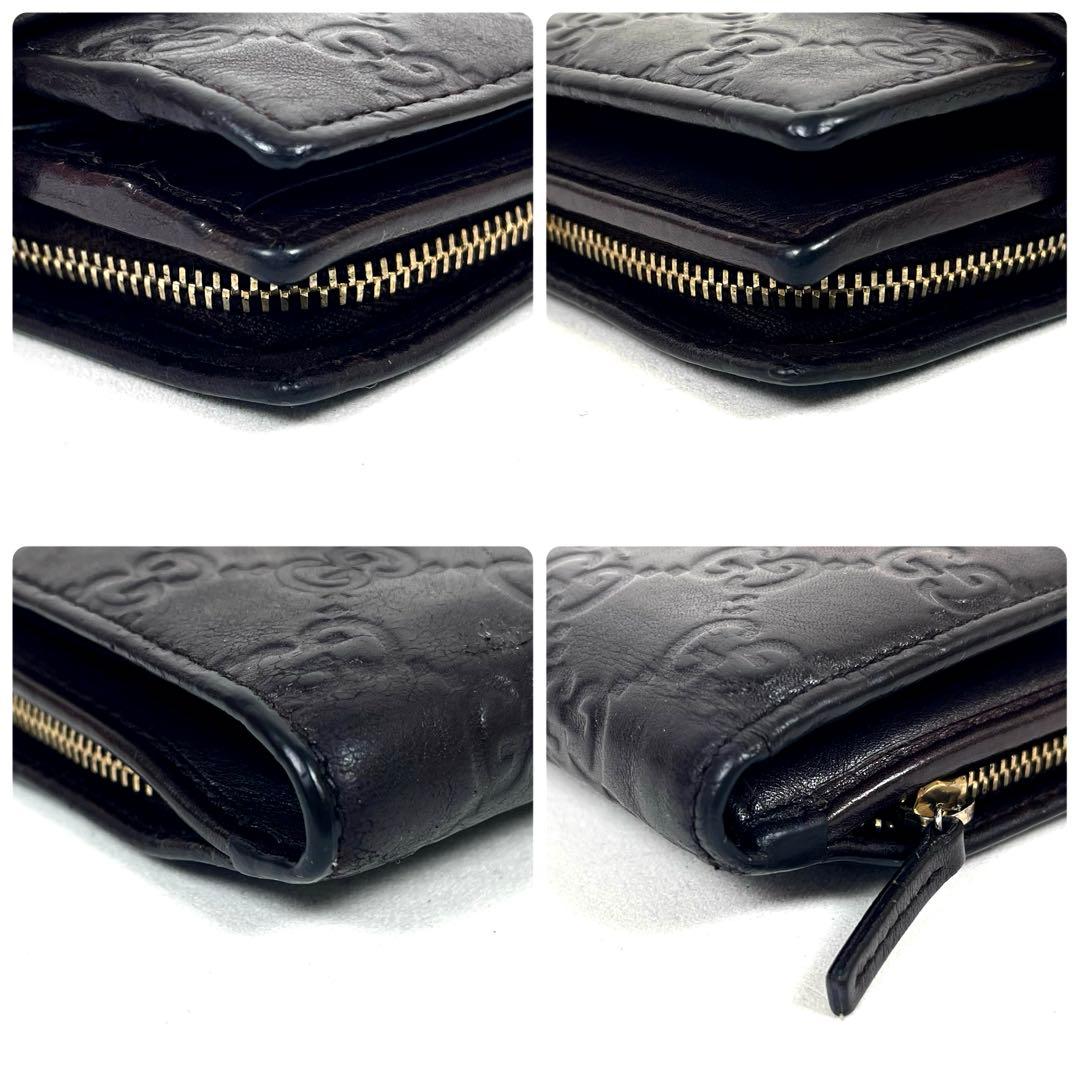 グッチ　二つ折り財布　アビー　シマレザー　ラウンドファスナー　ロゴ　エンボス