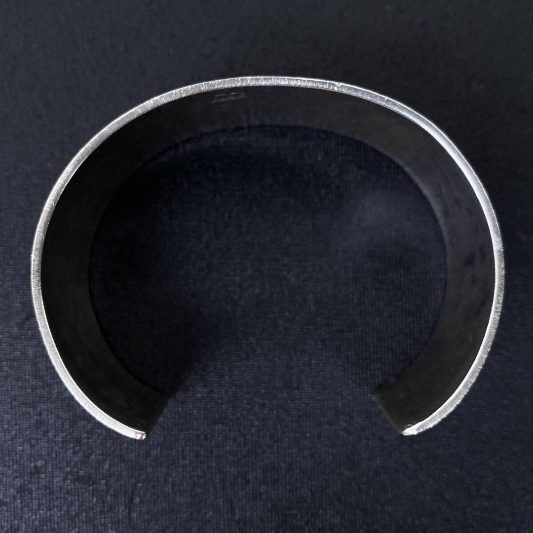 NAVAJO Derrick Cadman シルバースタースタンプワークバングル